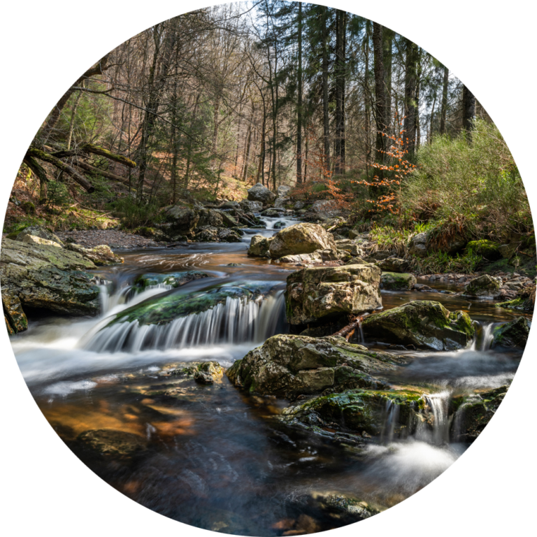 fotobehang natuurfoto waterval rotsen prachtig muurcirkel